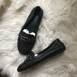 Coach black leather loafers with logo
